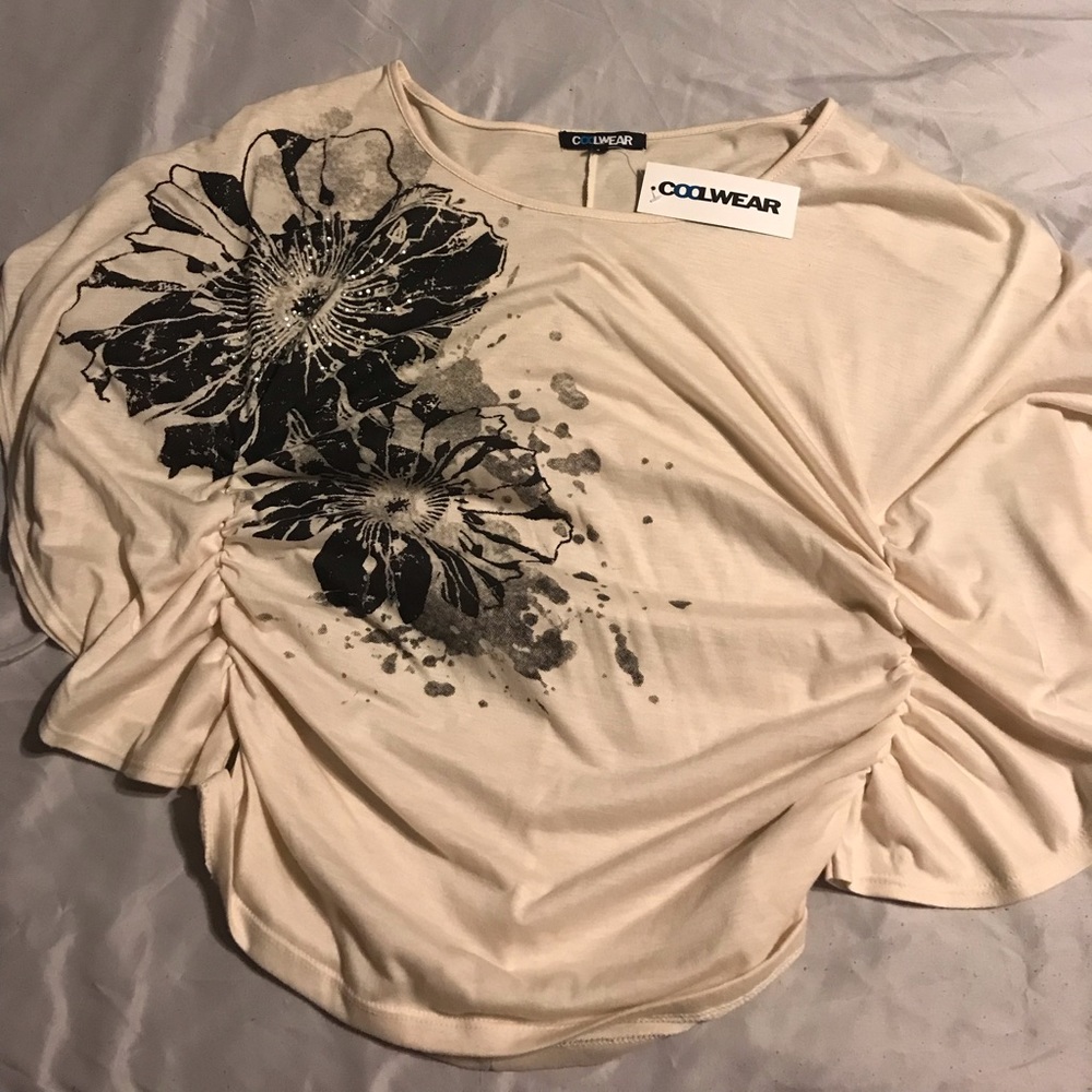 Coolwear top with gathered sides.